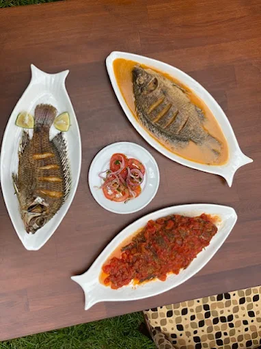 Tilapia dishes served on fish-shaped plates